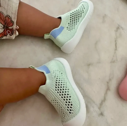 Lamova baby shoes designed for first steps with flexible, lightweight soles that allow natural foot movement and development. These non-slip shoes provide secure grip and stability on various surfaces, helping babies walk confidently and safely. Made from soft, breathable materials, Lamova shoes ensure comfort all day long while supporting delicate feet, making them ideal for infants learning to walk and explore.